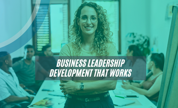 Business leader at team meeting representing effective leadership development in the workplace.
